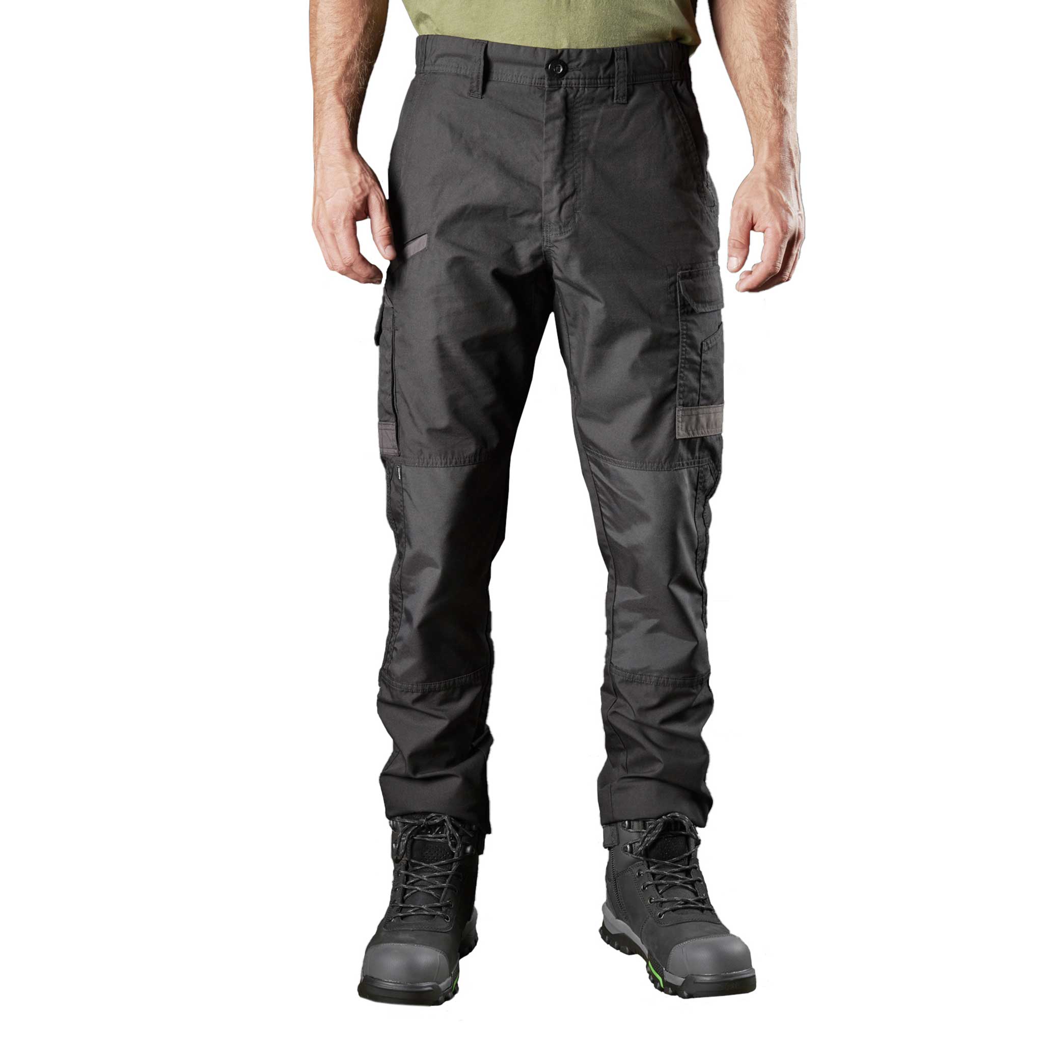 Person in black stretch work pants with multiple pockets and boots.